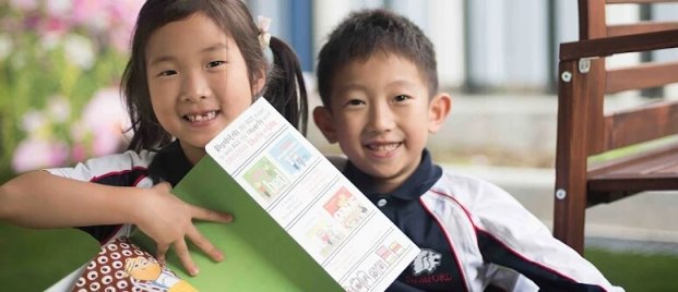 Students reading in Stamford American HK Garden