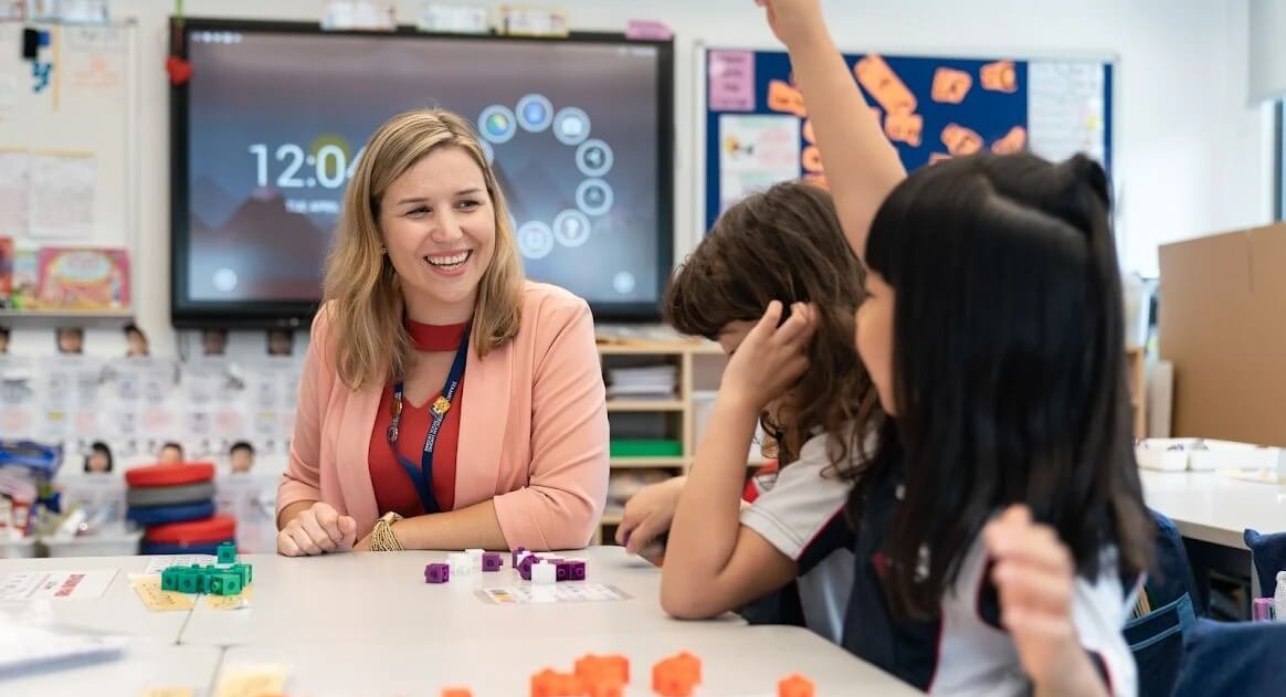 Elementary principal joining elementary math class at Stamford American HK