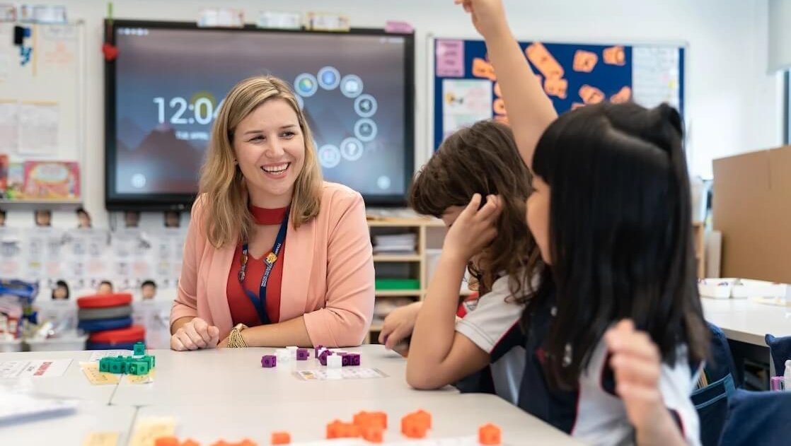 Elementary principal joining elementary math class at Stamford American HK