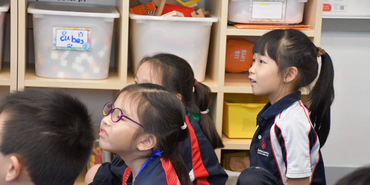 children listening in class