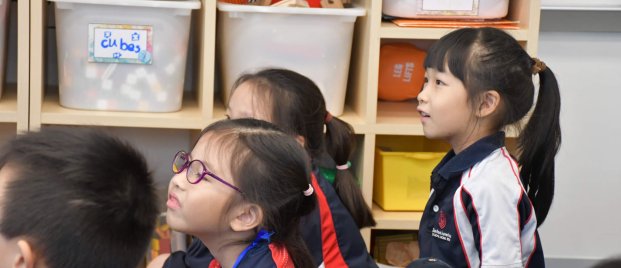 children listening in class