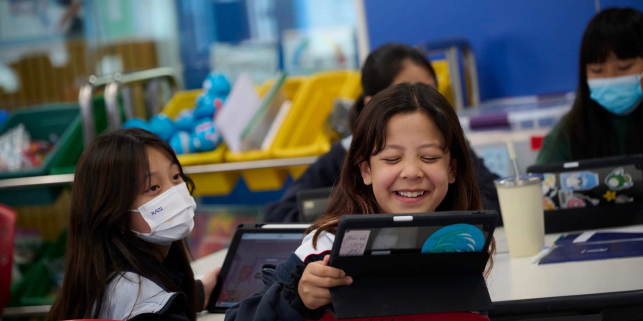 child playing on a device
