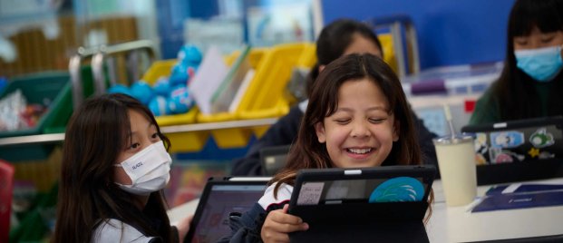 child playing on a device