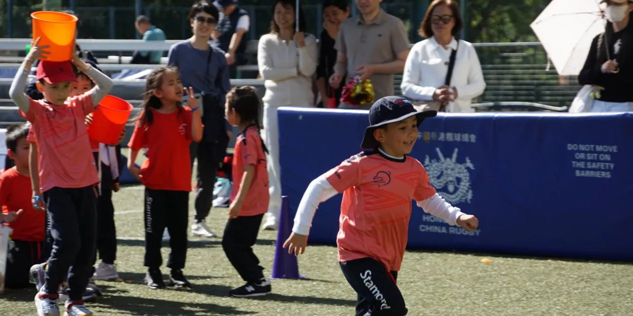 child playing at a sports day