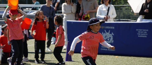 child playing at a sports day