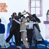child performing on stage