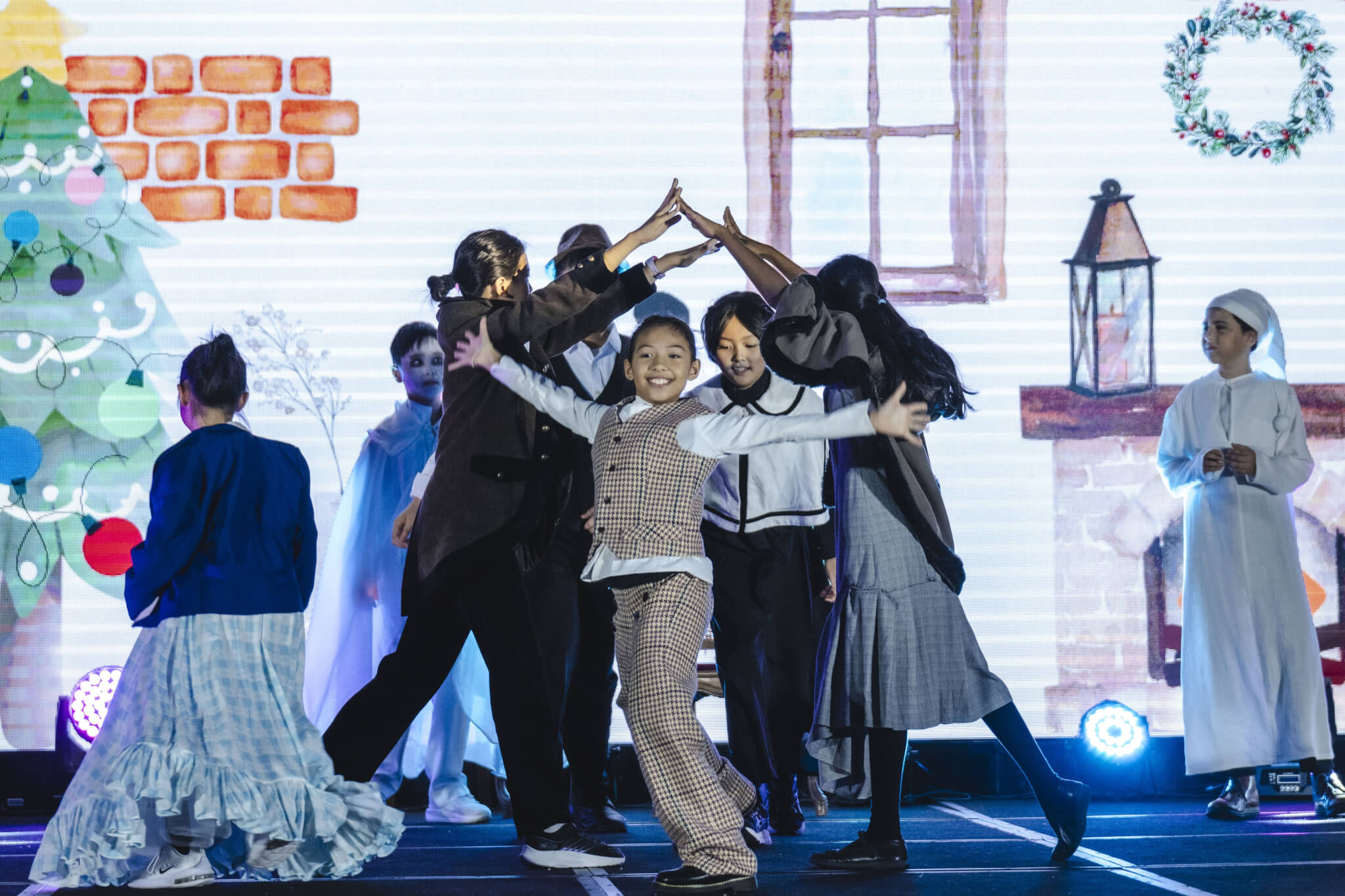 child performing on stage