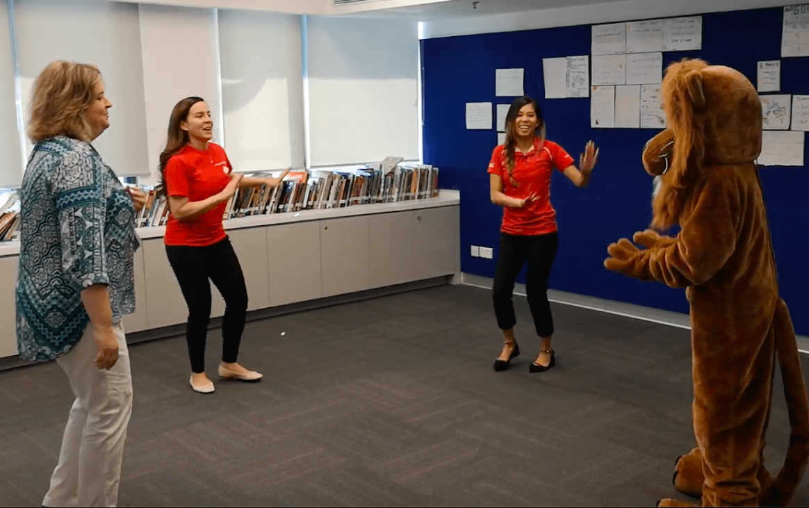 Stamford HK teachers demonstrate fun music activities.