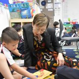 teacher reading to kids