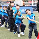 children playing at a sports day